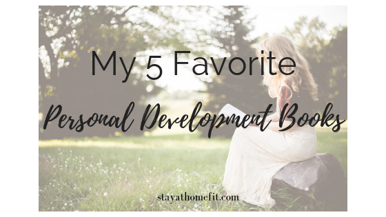 title of blog post- my 5 favorite personal development books- with picture of woman reading book in a field