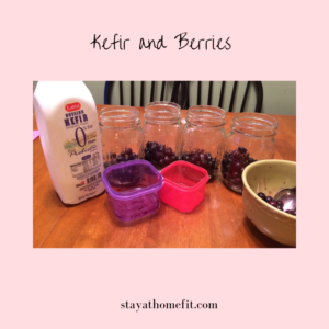 Kefir and Berries, photo of mason jars and frozen berries and kefir for healthy breakfast option